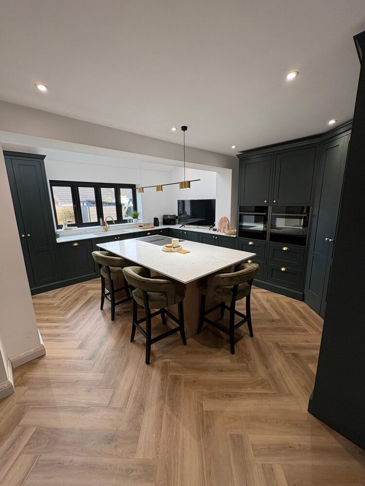 Bright finished extension interior with roof lights