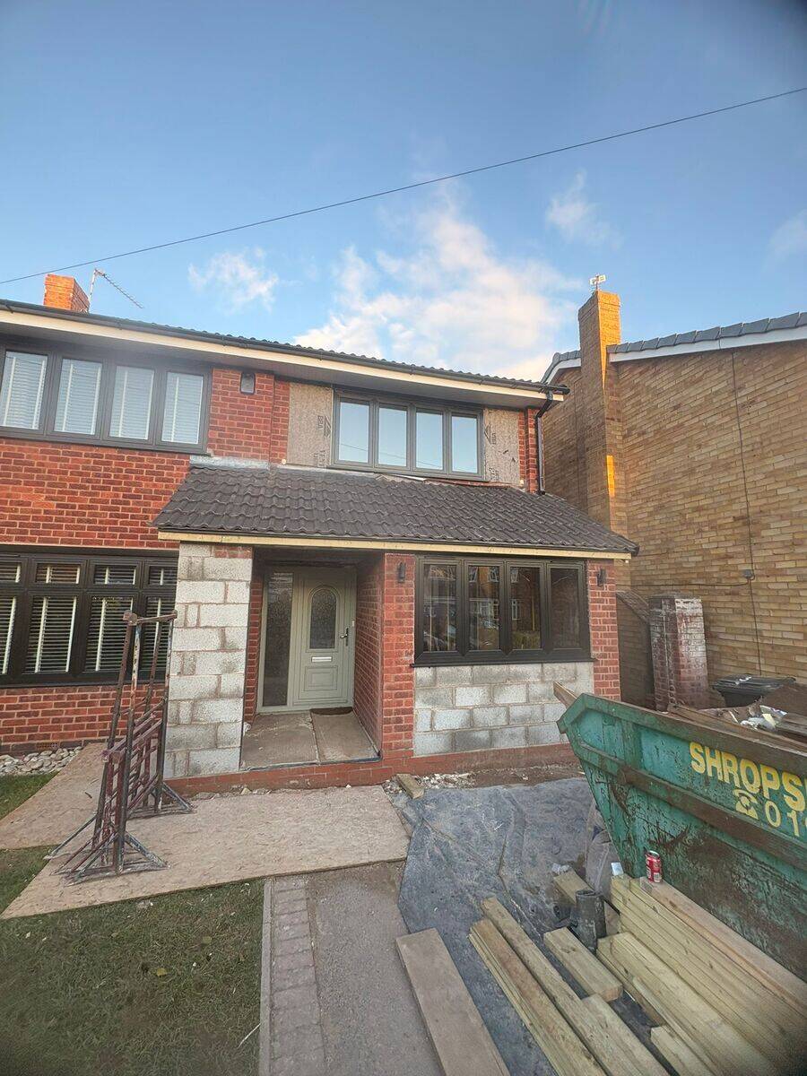 Garage conversion exterior structure underway